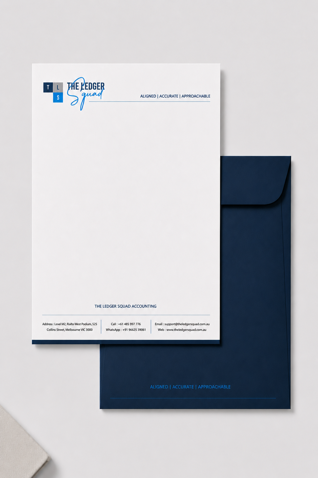 The Ledger Squad A4 letterhead over C4 navy envelope